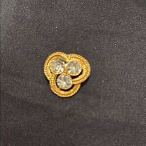 Elegant Gold and Silver Knot Brooch